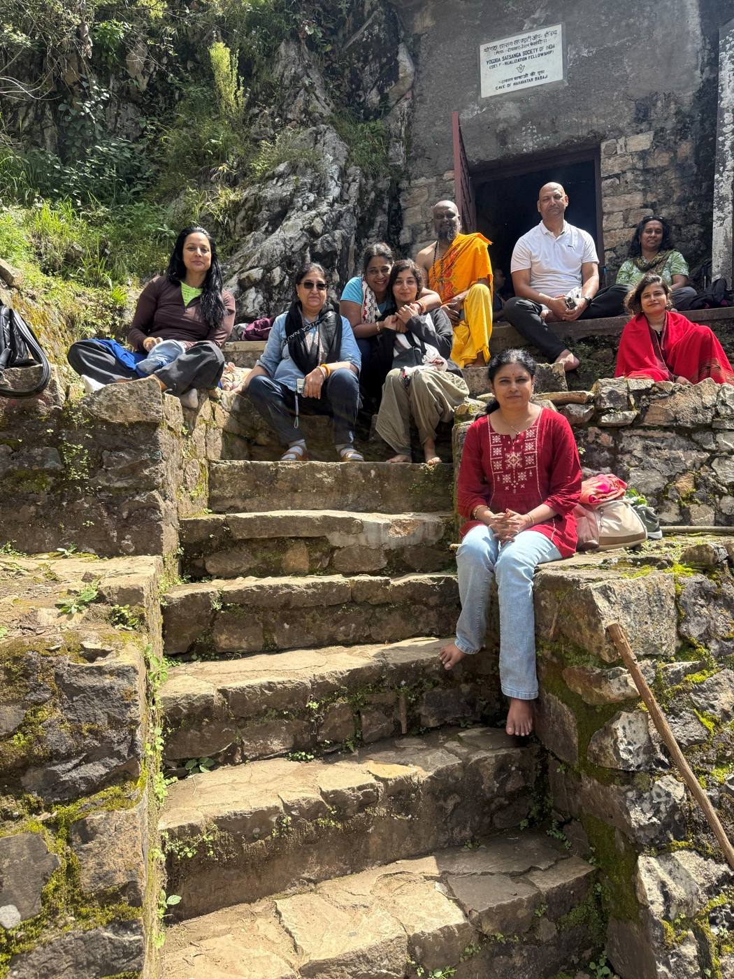 The group gathered on the stone steps at Mahavtar Babaji's Cave.