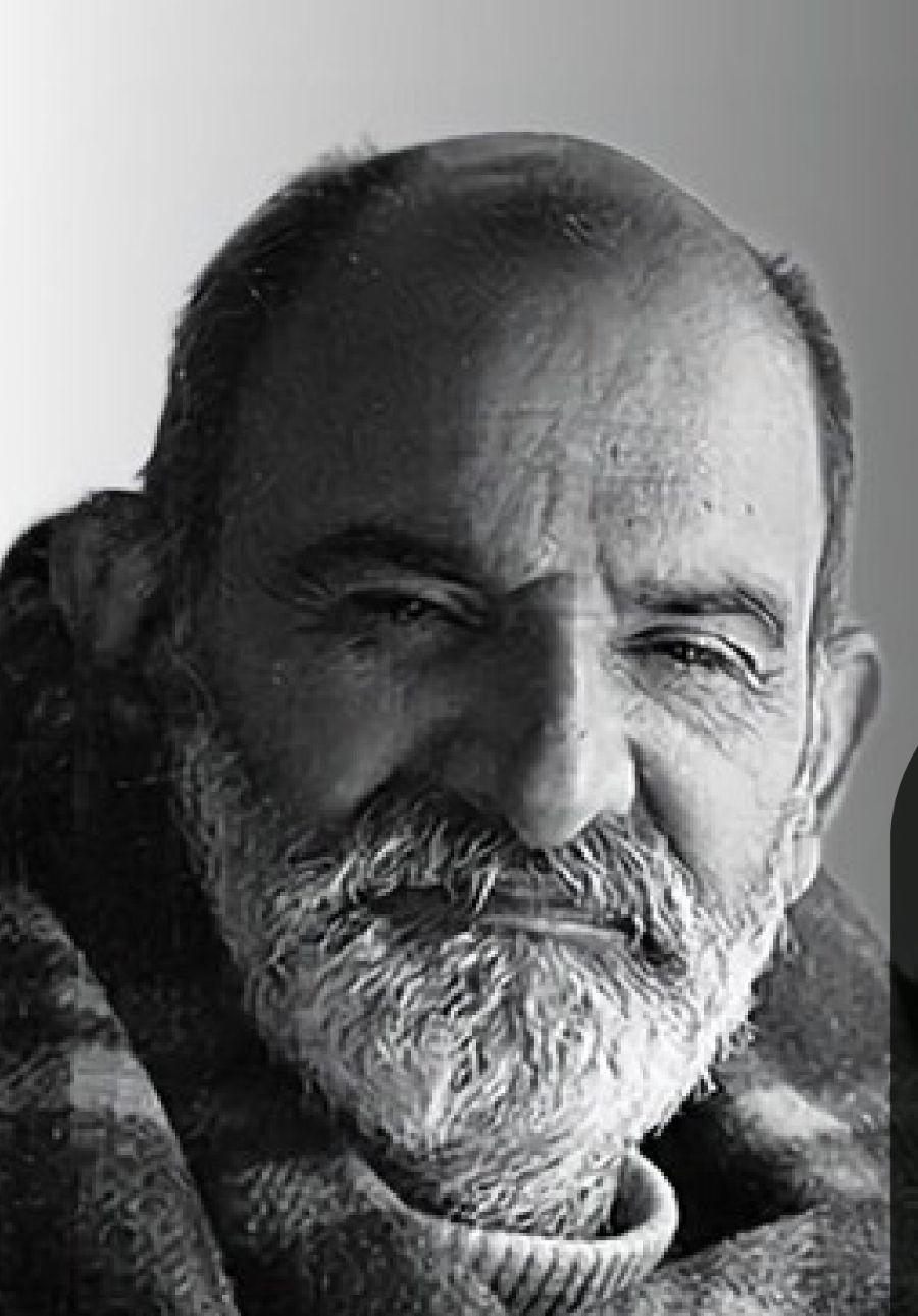 Neem Karoli Baba wrapped in his blanket.